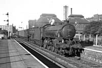 24BKH B1 61021 ‘Reitbok’ and a Stanier 5MT head the Newcastle to 		        Manchester empty stock Newspaper train through Castleton. B K Hilton. 